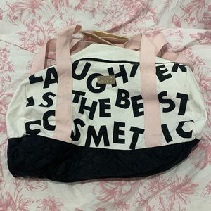 NWOT Benefit Duffel Bag
